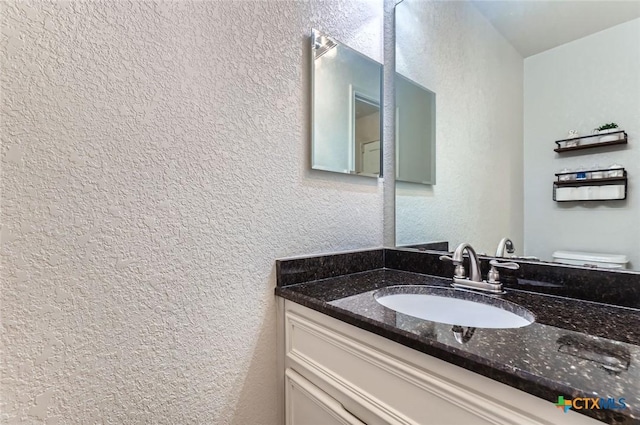 4201 Breckenridge Dr, Killeen, TX 76542 - bathroom with vanity and a textured wall