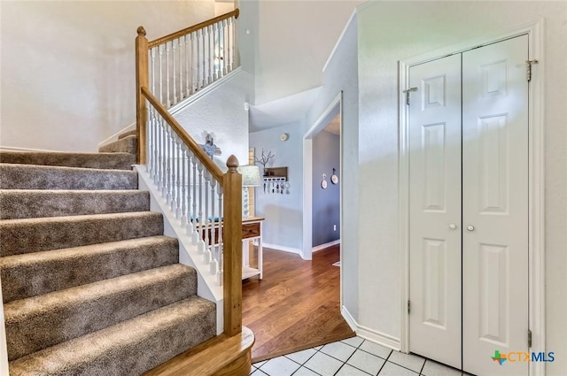 4201 Breckenridge Dr, Killeen, TX 76542 - stairway featuring tile patterned flooring and baseboards