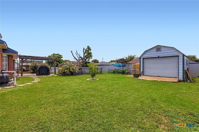 4201 Breckenridge Dr, Killeen, TX 76542 - fenced backyard featuring a garage and a storage shed
