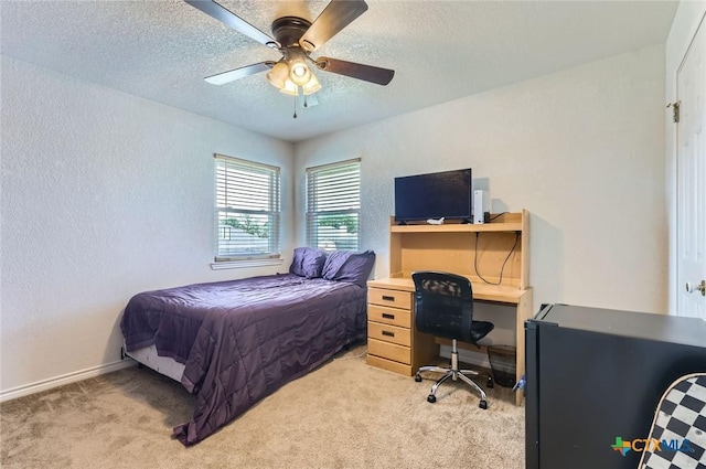 4201 Breckenridge Dr, Killeen, TX 76542 - bedroom featuring light colored carpet, a desk, a textured ceiling, a textured wall, and a ceiling fan