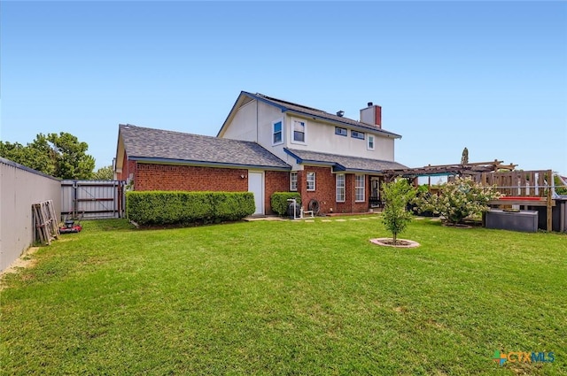 4201 Breckenridge Dr, Killeen, TX 76542 - back of house featuring a chimney, brick siding, and a fenced backyard
