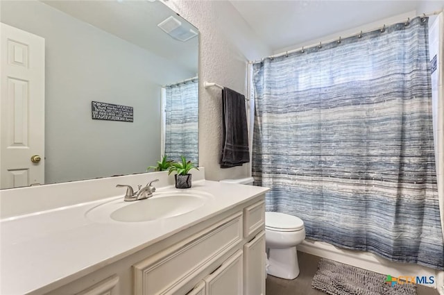 4201 Breckenridge Dr, Killeen, TX 76542 - bathroom featuring vanity, shower / bath combo, and a textured wall