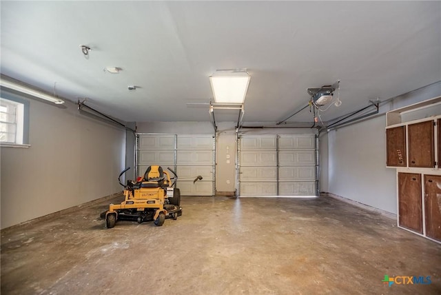 garage featuring a garage door opener