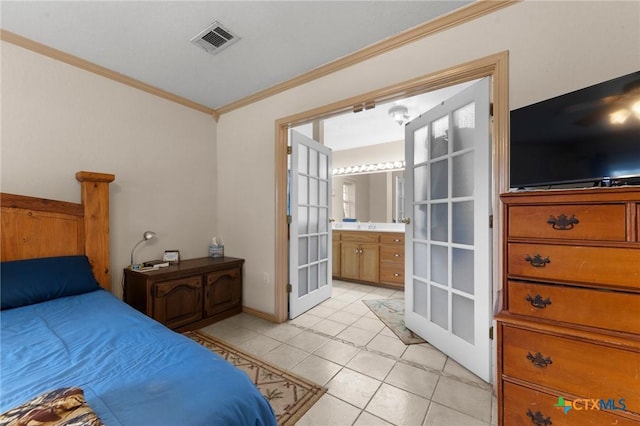 bedroom with visible vents, ornamental molding, connected bathroom, french doors, and light tile patterned floors