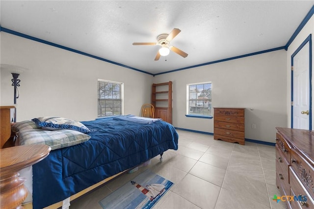 bedroom featuring crown molding, baseboards, a ceiling fan, and light tile patterned floors