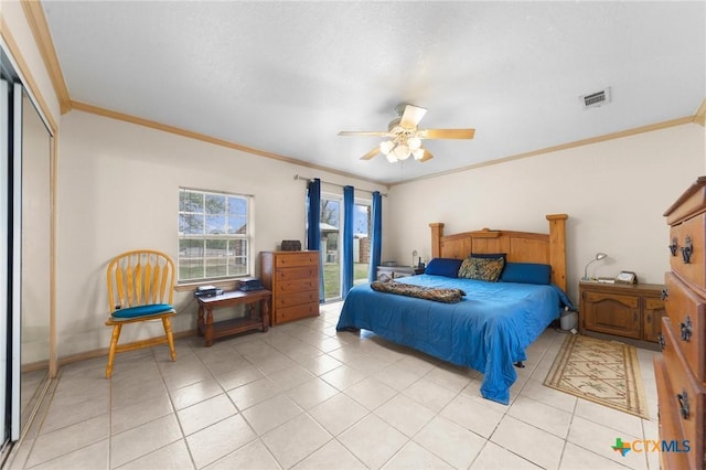 bedroom with a ceiling fan, crown molding, light tile patterned floors, access to exterior, and visible vents