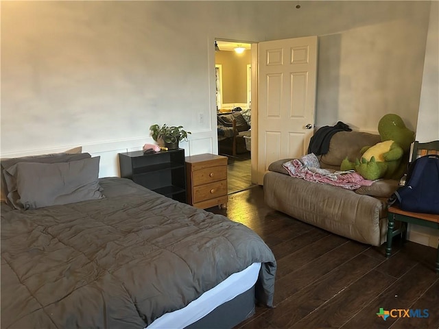 101 Alva St, Thrall, TX 76578 - bedroom with dark wood-style flooring