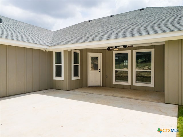 property entrance featuring a patio and ceiling fan