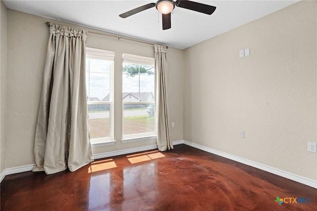 empty room featuring ceiling fan