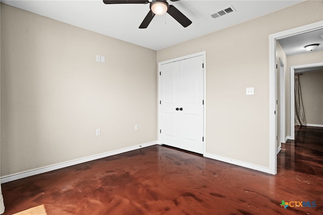 unfurnished bedroom featuring a closet and ceiling fan