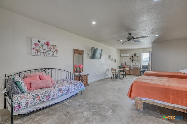 bedroom featuring a textured ceiling, concrete flooring, and ceiling fan