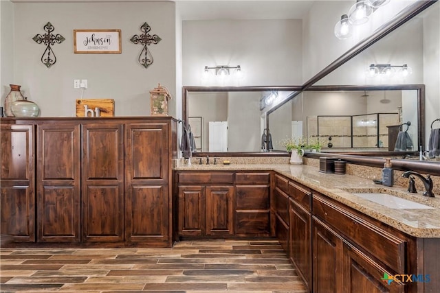 6 Salta Ct, Belton, TX 76513 - bathroom featuring wood finished floors and double vanity