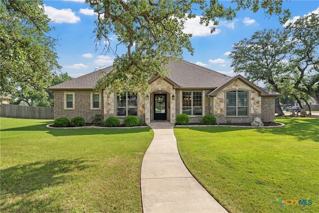 6 Salta Ct, Belton, TX 76513 - view of front of property featuring stone siding, roof with shingles, and brick siding