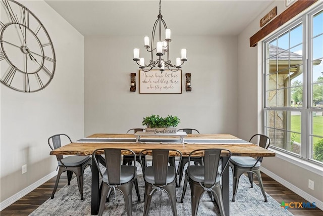 6 Salta Ct, Belton, TX 76513 - dining area featuring a chandelier, baseboards, and dark wood-style flooring