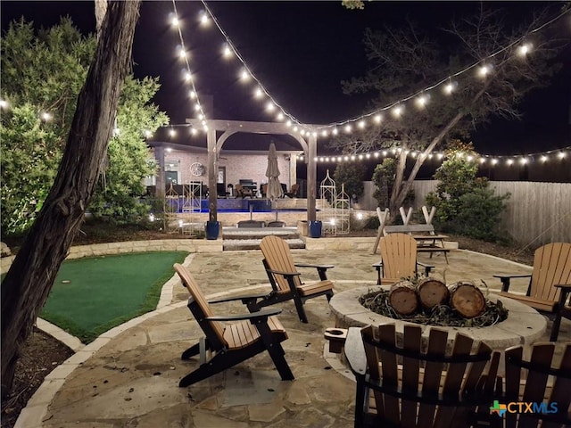 6 Salta Ct, Belton, TX 76513 - view of community featuring a putting green, a fire pit, and a patio