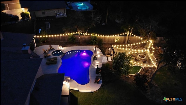 6 Salta Ct, Belton, TX 76513 - pool at twilight with a fire pit, a patio area, and a fenced backyard