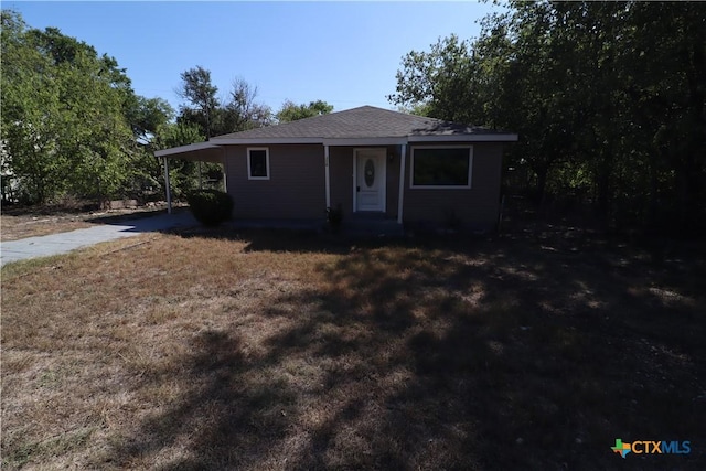 view of front of house with a carport