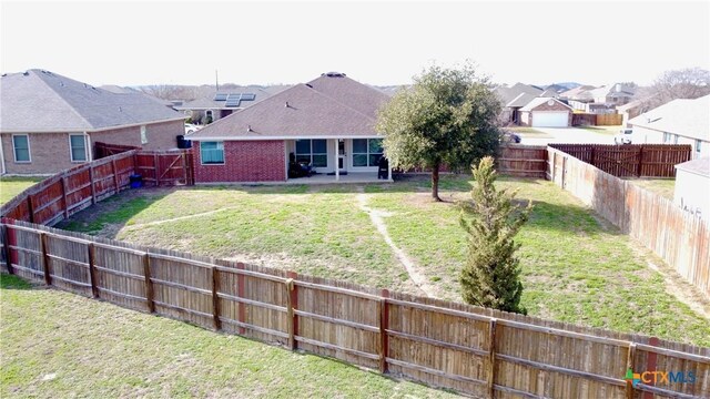 back of house featuring a patio area