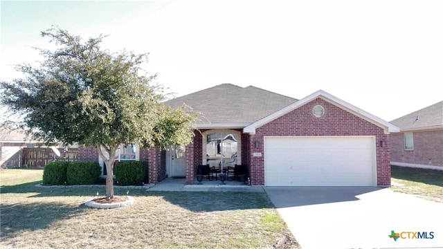 single story home with a garage and a front yard