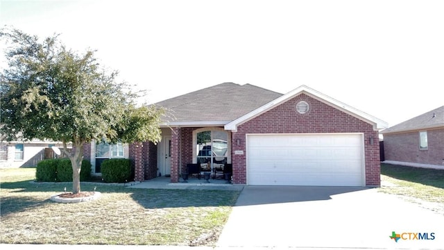 ranch-style house featuring a garage