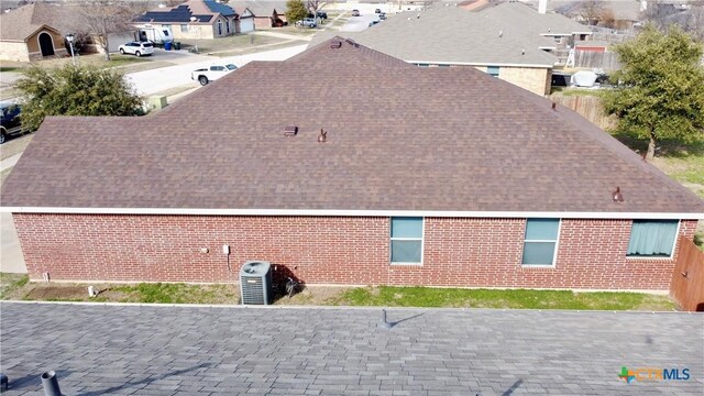 back of house featuring a yard and a patio