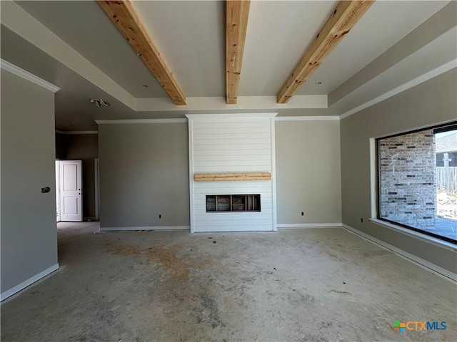 unfurnished living room with beam ceiling, ornamental molding, and a fireplace