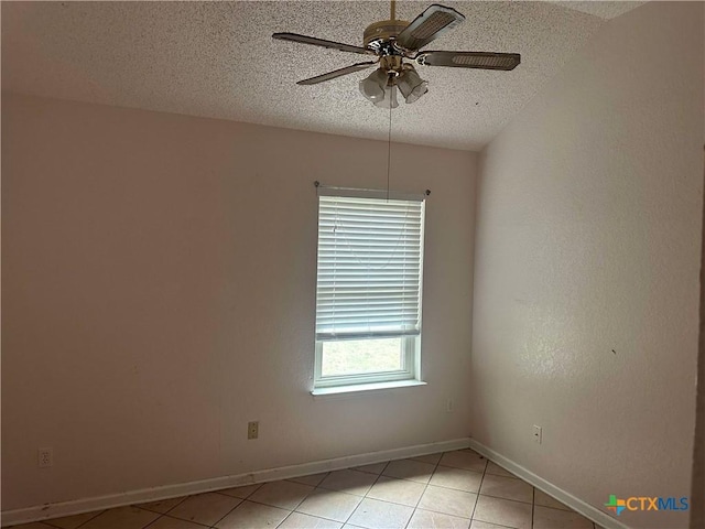 307 Illinois Dr, Harker Heights, TX 76548 - unfurnished room featuring a textured ceiling, light tile patterned floors, a ceiling fan, and baseboards