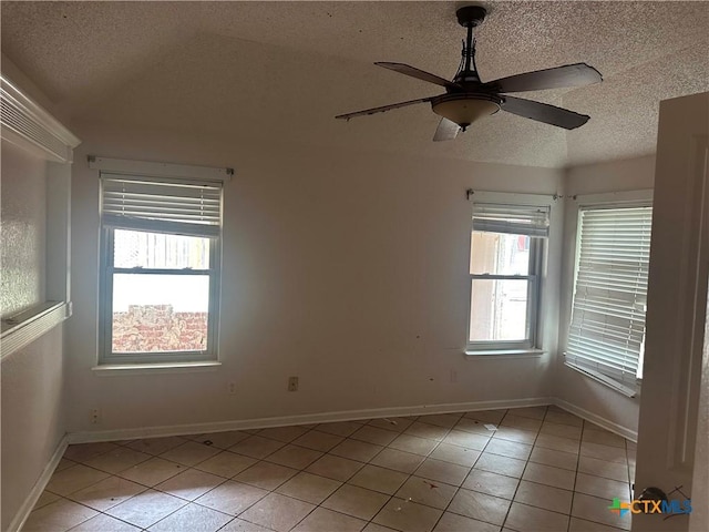 307 Illinois Dr, Harker Heights, TX 76548 - spare room featuring a textured ceiling, light tile patterned flooring, ceiling fan, and baseboards