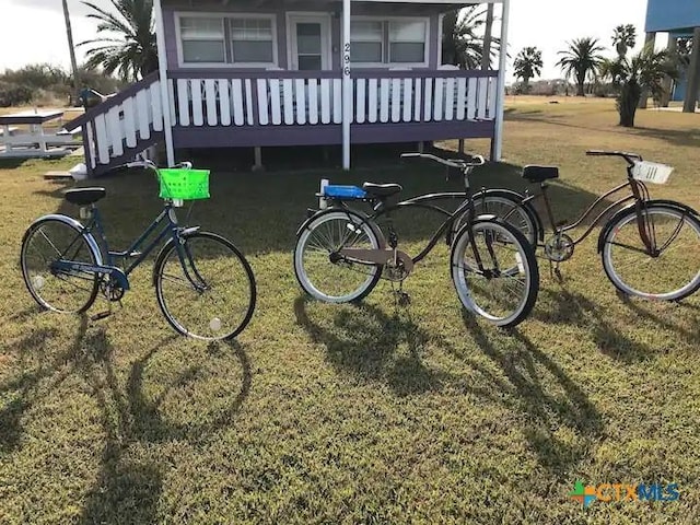 296 S Ocean Dr, Port Lavaca, TX 77979 - view of property exterior featuring a lawn