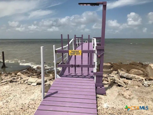 dock area featuring a water view