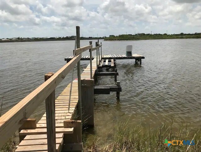 dock area featuring a water view