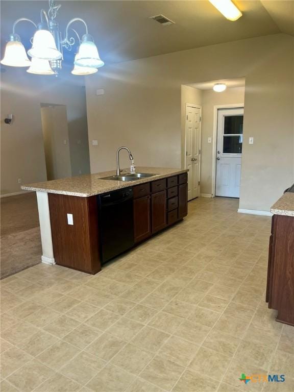 1205 Abbey Rdg, Temple, TX 76504 - kitchen featuring black dishwasher, an island with sink, decorative light fixtures, light stone countertops, and lofted ceiling