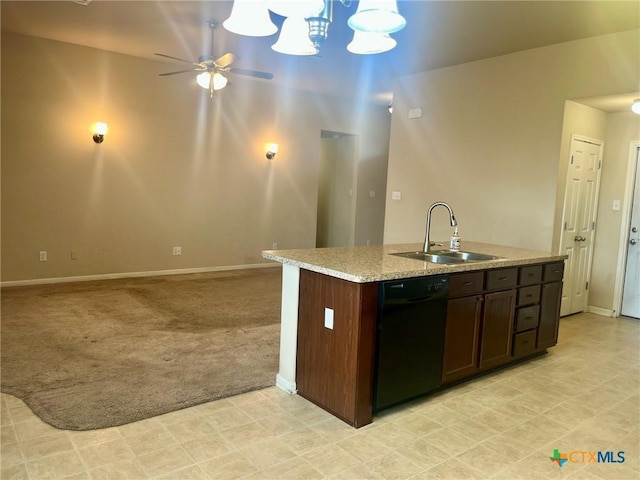 1205 Abbey Rdg, Temple, TX 76504 - kitchen featuring dishwasher, light colored carpet, ceiling fan, a center island with sink, and dark brown cabinets