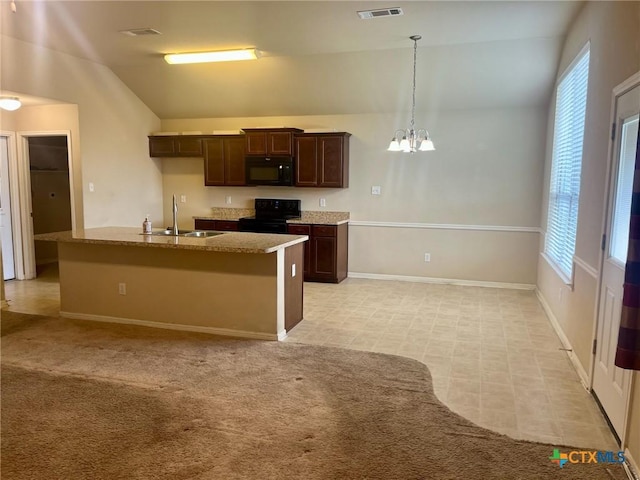 1205 Abbey Rdg, Temple, TX 76504 - kitchen featuring black appliances, a chandelier, dark brown cabinets, plenty of natural light, and lofted ceiling