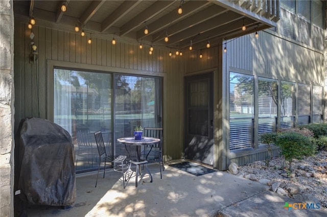 doorway to property featuring a patio