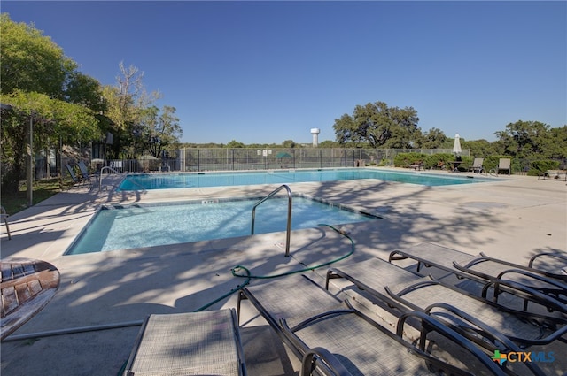 view of pool featuring a patio