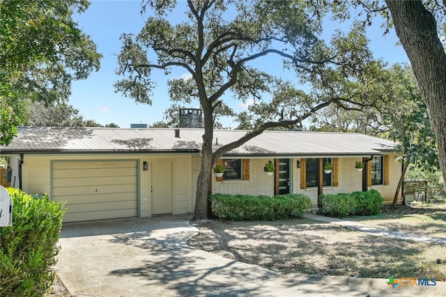 ranch-style house with a garage