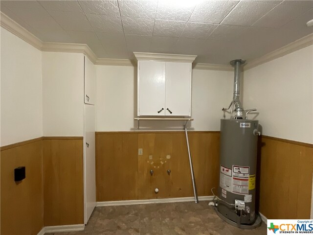 utility room with gas water heater