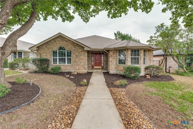 820 California Blvd, New Braunfels, TX 78130 - view of front of house with brick siding and roof with shingles