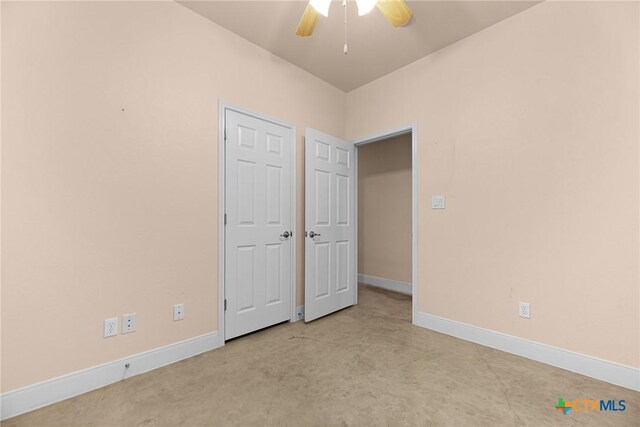 225 Anne Louise Dr, New Braunfels, TX 78130 - unfurnished bedroom featuring baseboards and ceiling fan