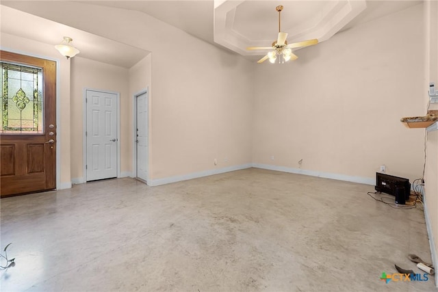 225 Anne Louise Dr, New Braunfels, TX 78130 - foyer entrance with concrete floors and ceiling fan