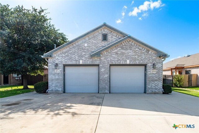 225 Anne Louise Dr, New Braunfels, TX 78130 - view of front of property featuring brick siding and concrete driveway