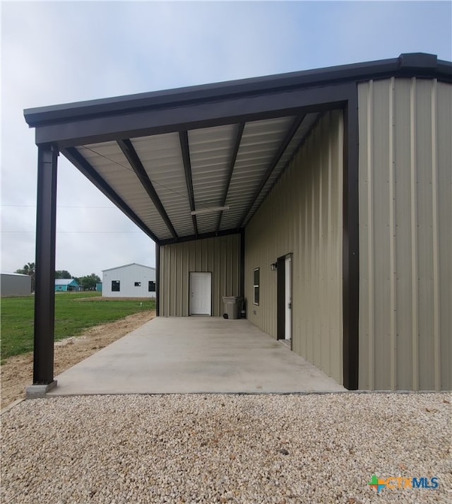 exterior space featuring a carport