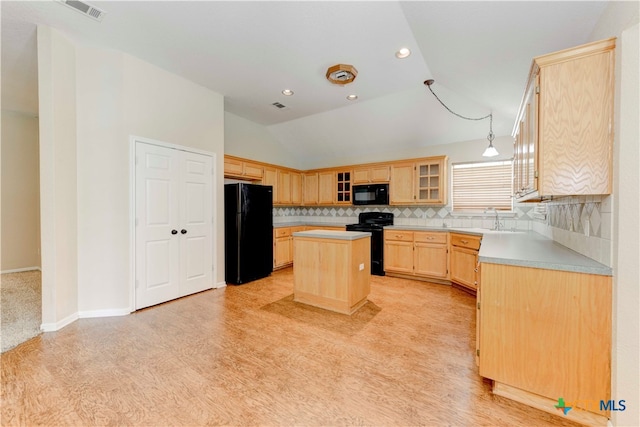 kitchen with black appliances, tasteful backsplash, light brown cabinetry, a center island, and vaulted ceiling