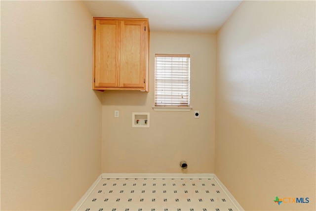 laundry room featuring cabinets, hookup for an electric dryer, and hookup for a washing machine