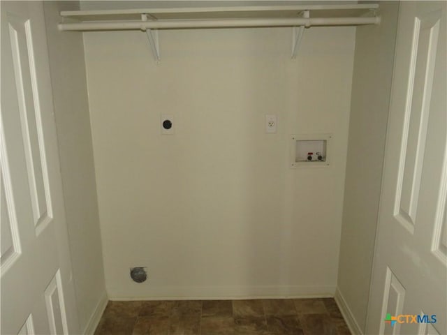 clothes washing area with washer hookup and hookup for an electric dryer