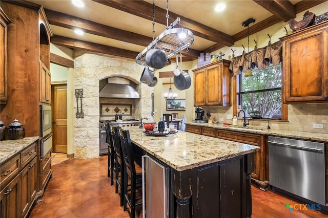 27302 Felswand Pkwy, New Braunfels, TX 78132 - kitchen featuring appliances with stainless steel finishes, a sink, beamed ceiling, decorative backsplash, and wall chimney exhaust hood