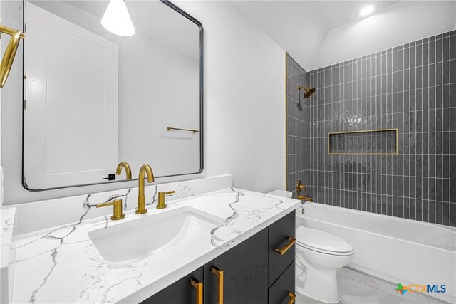 303 W Lane Ave, Manor, TX 78653 - bathroom with vanity and bathtub / shower combination