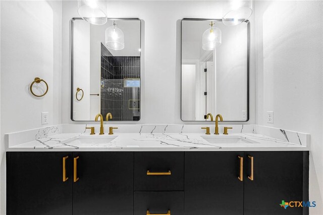303 W Lane Ave, Manor, TX 78653 - full bath featuring double vanity and tiled shower