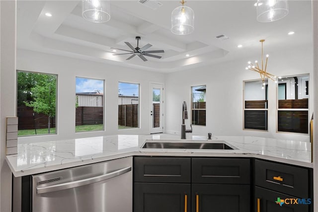 303 W Lane Ave, Manor, TX 78653 - kitchen with dishwasher, recessed lighting, light stone counters, pendant lighting, and a ceiling fan